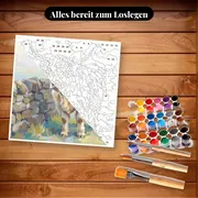 Malen nach Zahlen cremefarbene Highland-Kuh an einer Mauer – Set bereit zum Loslegen auf dem Tisch