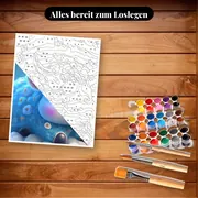 Malen nach Zahlen blaue Kuh auf einer Wolke – Set bereit zum Loslegen auf dem Tisch