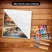 Malen nach Zahlen Herbst-Cottage und Holzbrücke – Set bereit zum Loslegen auf dem Tisch